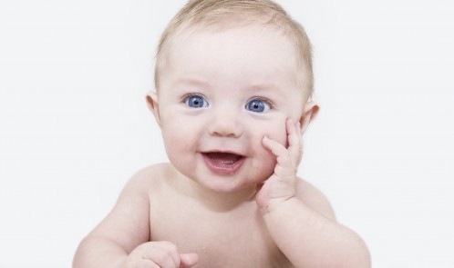 Baby boy posing for his first portrait